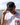 Model wearing the Fore Fuel Unstructured Rope Hat outside with a lake and blue sky as the background