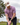 Male model wearing the Hoppy Hour Pique Polo on the golf course with greenery in the background