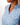 Collar of Lily Pond Sleeveless Polo on Model in front of grey background