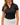 Front of the Loon Lake 2.0 Pique Polo tucked on a model in front of a white background