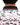 Waggle W patch on the back of the Mesa Pique Polo on a male model in front of a white background