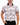 Tucked in Front of the Mesa Pique Polo on a male model in front of a white background