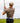 Model wearing the Outlaw Polo on the golf course with greenery & sky in the background