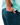 Close up on the back right pocket of the Pacific Daydrift Shorts on a male model in front of a white background