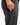 Close up on the Accessory pocket on the right leg of the Ace Pants on a model in front of a white background
