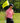 Male Model wearing the Solo Polo on the Golf Course with greenery in the background
