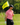 Male Model wearing the Solo Polo on the Golf Course with greenery in the background