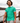 Model wearing the Tortuga Pique Polo walking along a river