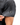 Waggle Logo on the left sleeve of the Ursa Major Polo on a male model in front of a white background