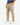 Front 3/4 of the Wheat Ace Pants on a model in front of a white background