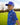 Model wearing the Abyss Polo on the golf course with greenery in the background.