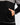 Close up on the left pocket on the Boy's Ash Zenith Zip Hoodie on a model in front of a light gray background