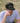 Model Wearing the Average Golf Hat on the course with greenery in the background