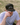 Model Wearing the Average Golf Hat on the course with greenery in the background