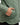 Close up on the right pocket on the Balsam Crosscut Bomber Jacket on a model in front of a light gray background