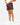 Front 3/4 of the Bear Path Shoreline Short revealing the elastic waistband and drawstring on a model in front of a light gray background.