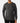 Front of the Big Foot's Big Wheels Long Sleeve T-Shirt on a Male Model in front of a light gray background.