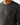 Close up on the Front Graphic on the Big Foot's Big Wheels Long Sleeve T-Shirt on a Male Model in front of a light gray background.