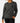 Front of the Big Foot's Big Wheels Long Sleeve T-Shirt on a Female Model in front of a light gray background.