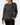 Front of the Big Foot's Big Wheels Long Sleeve T-Shirt on a Female Model in front of a light gray background.
