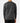 Back of the Big Foot's Big Wheels Youth T-Shirt on a Boy Model in front of a light gray background.
