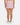 Back of the Pacesetter Skort on a model in front of a light gray background.