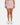 Front of the Pacesetter Skort on a model in front of a light gray background.