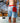 Model wearing the Bobby Shoreline Short climbing into a hot tub.