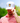 Model wearing the Breakfast of Golfers Hat on the golf course with greenery in the background
