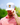 Model wearing the Breakfast of Golfers Hat on the golf course with greenery in the background