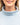Close up on the funnel neck rolled up on the Breeze Plume Funnel Neck Sweatshirt on a model in front of a white background