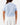 Back of the Girls Cape Cod Polo tucked in on a model in front of a light gray background.