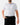 Front of the Cribbage Polo tucked in on a model in front of a light gray background.