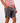 Right side of Dark Gray Scramble shorts on a Model in front of white background