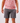 Front of Dark Gray Scramble shorts on a Model in front of white background