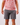 Front of Dark Gray Scramble shorts on a Model in front of white background