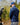 Male model wearing the Deep Waters Twilight Quarter Zip on the course with greenery in the background