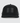 Front of Black Defined Hat, the hat is in front of an off white background. The Hat features a leather patch that has the definition of Waggle written out on it.