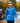 A Model wearing the Downpour Albatross Anorak Jacket at the boat landing walking down the dock.