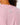 Close up on the Waggle W logo on the back of the Dusty Rose Long Sleeve Hexcore T-Shirt on a model in front of a light gray background.