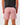 Back of Dusty Rose Scramble shorts on a Model in front of white background