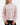 Front of the Dusty Rose Waffle Knit Hoodie on a model in front of a light gray background