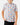 Untucked Front of the Fast Lane Polo on a model in front of a light gray background.