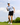 Male golfer fist pumping after a good putt, dressed in the Beached It Hat and Floater Polo.
