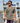 Front of the Flower Power Camp Shirt on a Male Model walking down a dock