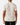 Back of the Fowl Play Polo on a model in front of a light gray background.