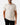 Front of the Fowl Play Polo on a model in front of a light gray background.