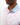 Collar of the Fresh Picked Pique Polo on a Male Model in front of a white background