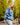 Female model wearing the Freshwater Wildknit Crewneck outside with greenery in the background