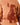Close up on the Graphic featured on the Frontier Wildknit Sweater on a Male Model in front of a light gray background.